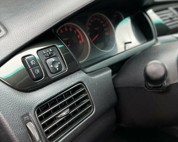 Чорний Міцубісі Lancer, об'ємом двигуна 2 л та пробігом 242 тис. км за 5900 $, фото 14 на Automoto.ua