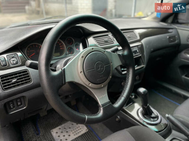 Чорний Міцубісі Lancer, об'ємом двигуна 2 л та пробігом 242 тис. км за 5900 $, фото 13 на Automoto.ua