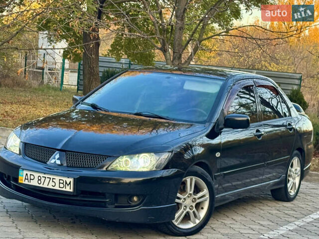 Міцубісі Lancer 2006 у Дніпро (Дніпропетровську) на Automoto.ua Чорний Міцубісі Lancer, об'ємом двигуна 2 л та пробігом 230 тис. км за 4900 $, фото 1 на Automoto.ua
