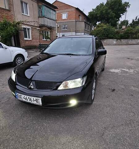 Чорний Міцубісі Lancer, об'ємом двигуна 1.6 л та пробігом 350 тис. км за 4950 $, фото 5 на Automoto.ua