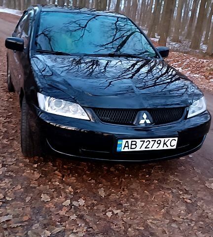 Чорний Міцубісі Lancer, об'ємом двигуна 1.6 л та пробігом 345 тис. км за 3700 $, фото 7 на Automoto.ua