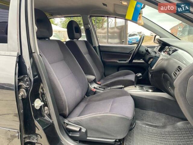 Чорний Міцубісі Lancer, об'ємом двигуна 2 л та пробігом 248 тис. км за 4990 $, фото 11 на Automoto.ua