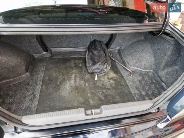 Черный Мицубиси Лансер, объемом двигателя 2 л и пробегом 168 тыс. км за 4999 $, фото 19 на Automoto.ua