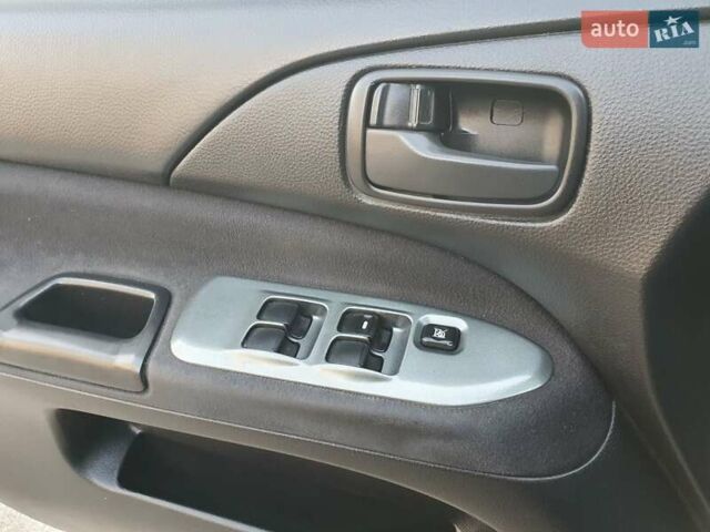 Черный Мицубиси Лансер, объемом двигателя 1.58 л и пробегом 222 тыс. км за 2999 $, фото 20 на Automoto.ua