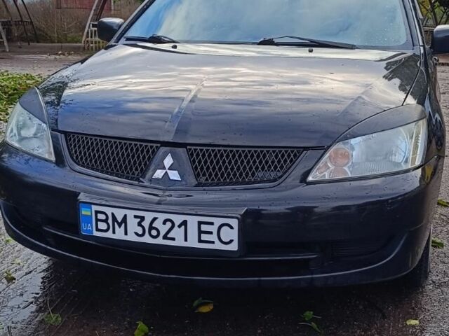 Чорний Міцубісі Lancer, об'ємом двигуна 1.6 л та пробігом 250 тис. км за 4000 $, фото 1 на Automoto.ua