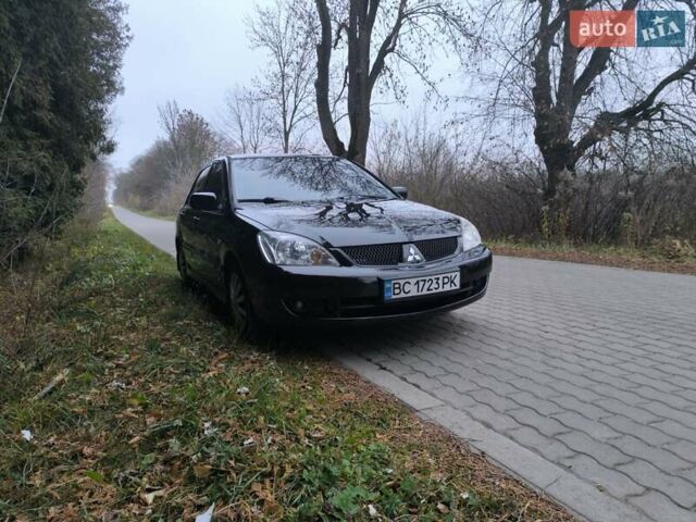 Черный Мицубиси Лансер, объемом двигателя 1.58 л и пробегом 246 тыс. км за 4200 $, фото 17 на Automoto.ua