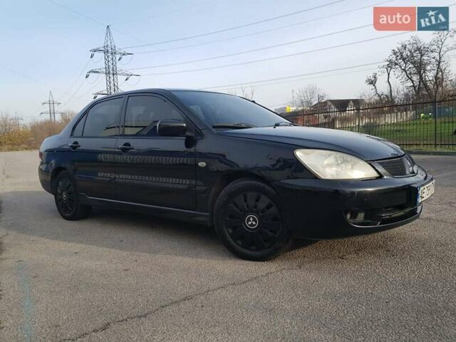 Чорний Міцубісі Lancer, об'ємом двигуна 1.58 л та пробігом 290 тис. км за 3200 $, фото 2 на Automoto.ua