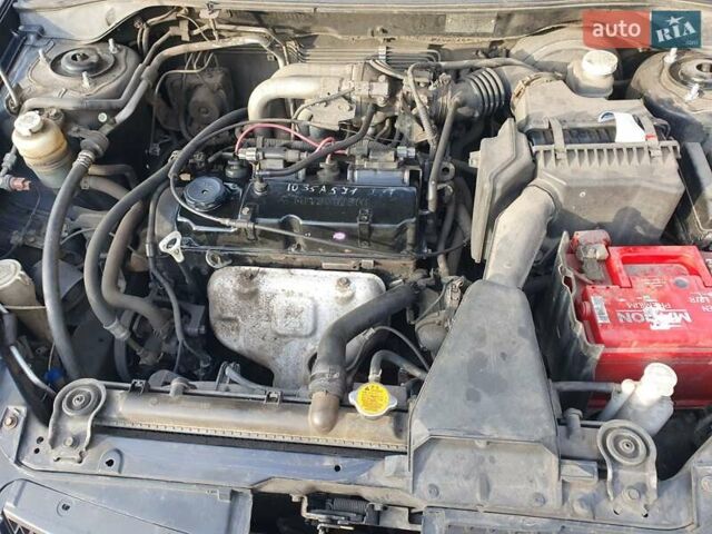 Черный Мицубиси Лансер, объемом двигателя 1.58 л и пробегом 222 тыс. км за 2999 $, фото 14 на Automoto.ua