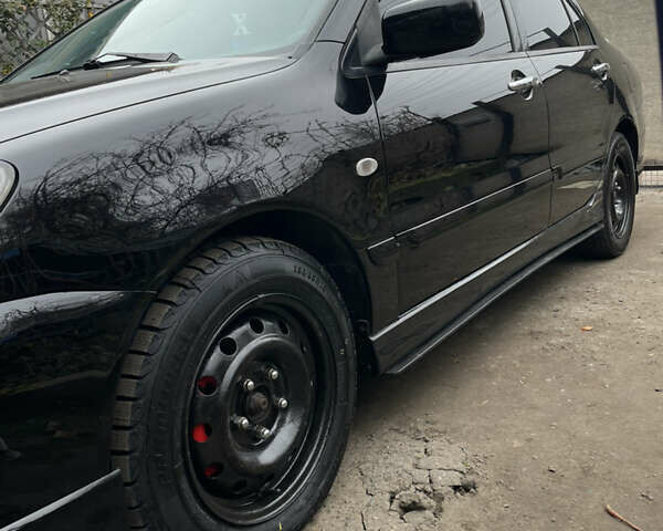 Чорний Міцубісі Lancer, об'ємом двигуна 2 л та пробігом 242 тис. км за 5900 $, фото 19 на Automoto.ua