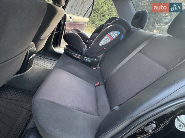 Міцубісі Lancer 2006 у Дніпро (Дніпропетровську) на Automoto.ua Чорний Міцубісі Lancer, об'ємом двигуна 2 л та пробігом 230 тис. км за 4900 $, фото 22 на Automoto.ua