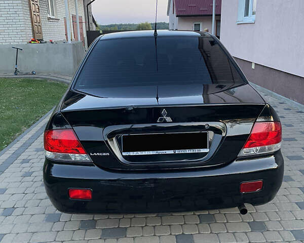 Чорний Міцубісі Lancer, об'ємом двигуна 1.6 л та пробігом 170 тис. км за 4900 $, фото 2 на Automoto.ua