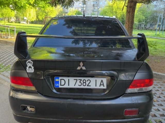 Чорний Міцубісі Lancer, об'ємом двигуна 1.6 л та пробігом 260 тис. км за 2500 $, фото 2 на Automoto.ua