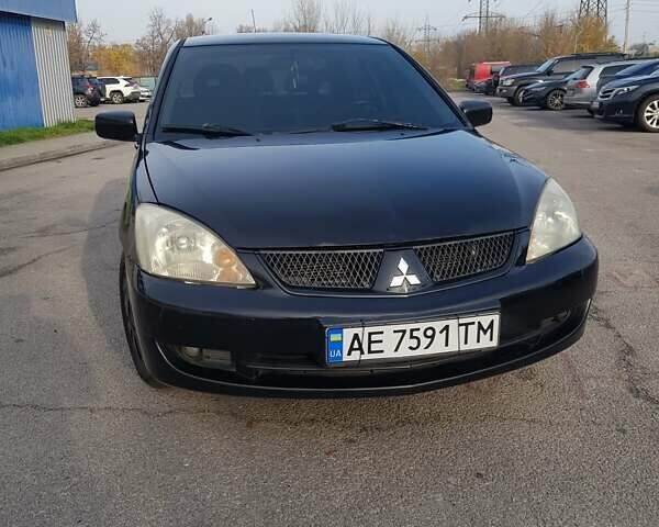 Чорний Міцубісі Lancer, об'ємом двигуна 1.58 л та пробігом 290 тис. км за 3200 $, фото 8 на Automoto.ua