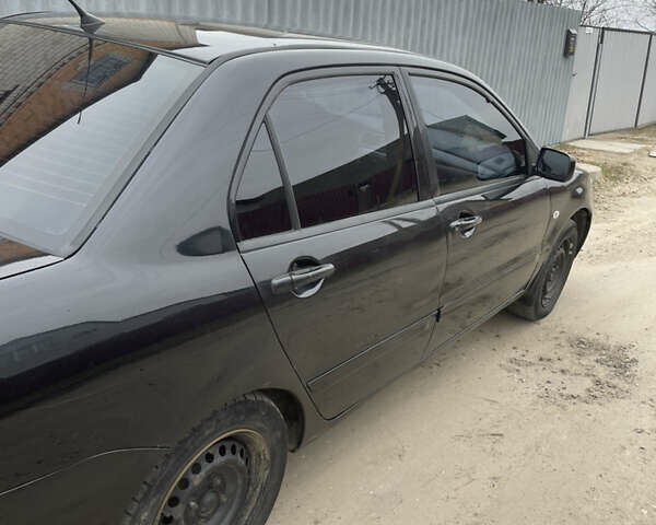 Чорний Міцубісі Lancer, об'ємом двигуна 1.58 л та пробігом 237 тис. км за 3800 $, фото 2 на Automoto.ua