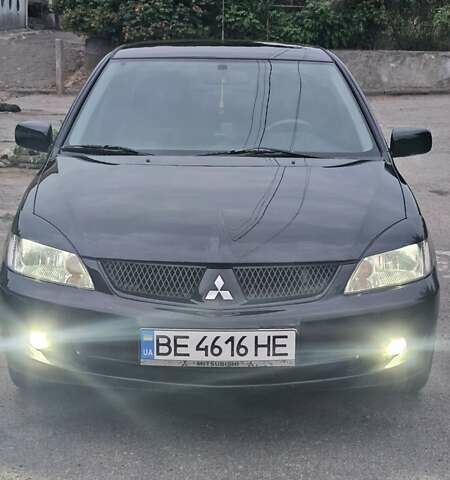 Чорний Міцубісі Lancer, об'ємом двигуна 1.6 л та пробігом 350 тис. км за 4950 $, фото 2 на Automoto.ua