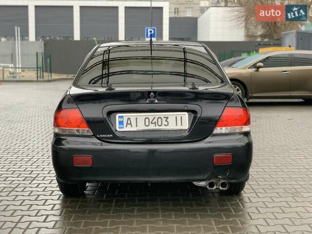 Чорний Міцубісі Lancer, об'ємом двигуна 1.58 л та пробігом 270 тис. км за 3950 $, фото 3 на Automoto.ua