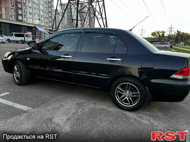 Чорний Міцубісі Lancer, об'ємом двигуна 1.6 л та пробігом 329 тис. км за 3500 $, фото 4 на Automoto.ua
