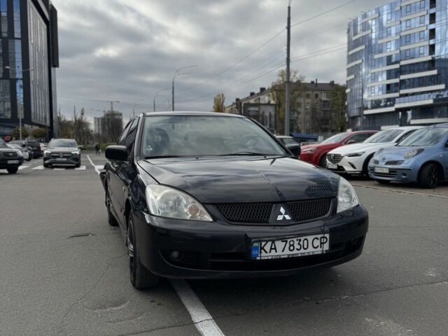 Черный Мицубиси Лансер, объемом двигателя 0 л и пробегом 319 тыс. км за 2700 $, фото 1 на Automoto.ua