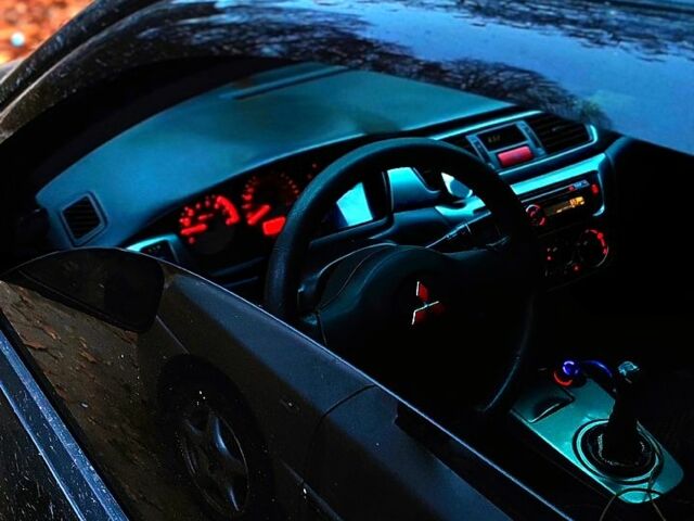 Чорний Міцубісі Lancer, об'ємом двигуна 1.6 л та пробігом 240 тис. км за 4000 $, фото 3 на Automoto.ua