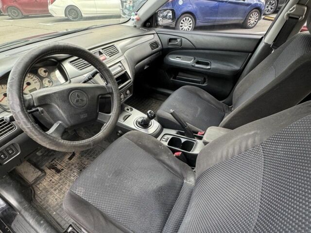 Черный Мицубиси Лансер, объемом двигателя 0 л и пробегом 319 тыс. км за 2700 $, фото 3 на Automoto.ua