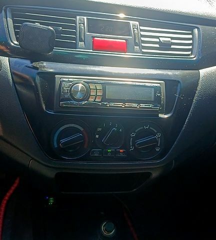 Черный Мицубиси Лансер, объемом двигателя 1.6 л и пробегом 238 тыс. км за 4300 $, фото 4 на Automoto.ua