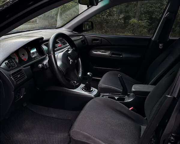 Чорний Міцубісі Lancer, об'ємом двигуна 1.6 л та пробігом 375 тис. км за 4500 $, фото 10 на Automoto.ua