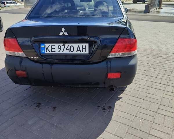 Чорний Міцубісі Lancer, об'ємом двигуна 1.58 л та пробігом 128 тис. км за 4600 $, фото 8 на Automoto.ua