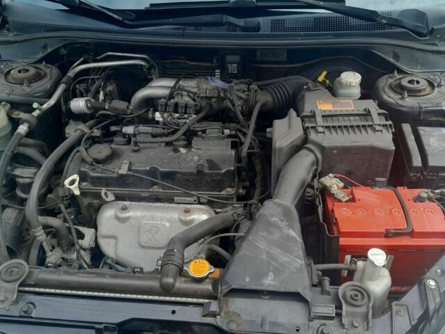 Черный Мицубиси Лансер, объемом двигателя 1.6 л и пробегом 260 тыс. км за 3800 $, фото 8 на Automoto.ua