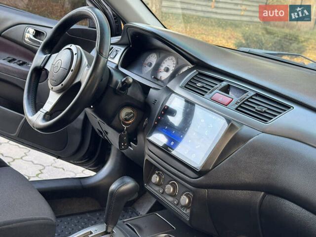 Міцубісі Lancer 2006 у Дніпро (Дніпропетровську) на Automoto.ua Чорний Міцубісі Lancer, об'ємом двигуна 2 л та пробігом 230 тис. км за 4900 $, фото 18 на Automoto.ua