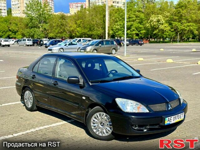 Черный Мицубиси Лансер, объемом двигателя 1.6 л и пробегом 208 тыс. км за 4999 $, фото 2 на Automoto.ua