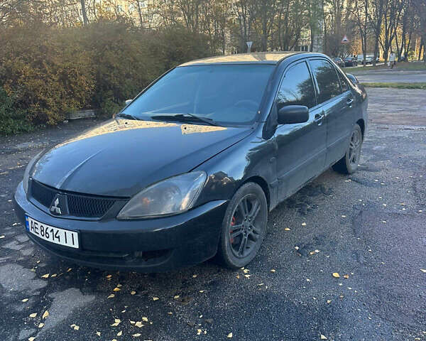 Чорний Міцубісі Lancer, об'ємом двигуна 2 л та пробігом 270 тис. км за 3300 $, фото 2 на Automoto.ua