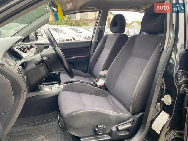 Чорний Міцубісі Lancer, об'ємом двигуна 2 л та пробігом 248 тис. км за 4990 $, фото 8 на Automoto.ua