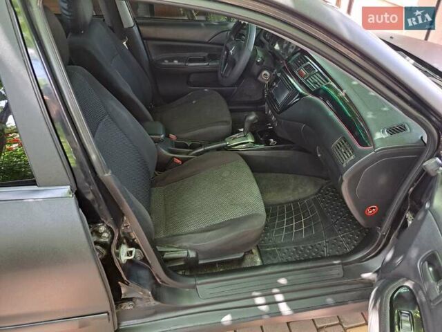 Чорний Міцубісі Lancer, об'ємом двигуна 1.58 л та пробігом 280 тис. км за 3950 $, фото 18 на Automoto.ua