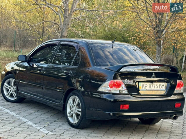 Міцубісі Lancer 2006 у Дніпро (Дніпропетровську) на Automoto.ua Чорний Міцубісі Lancer, об'ємом двигуна 2 л та пробігом 230 тис. км за 4900 $, фото 9 на Automoto.ua