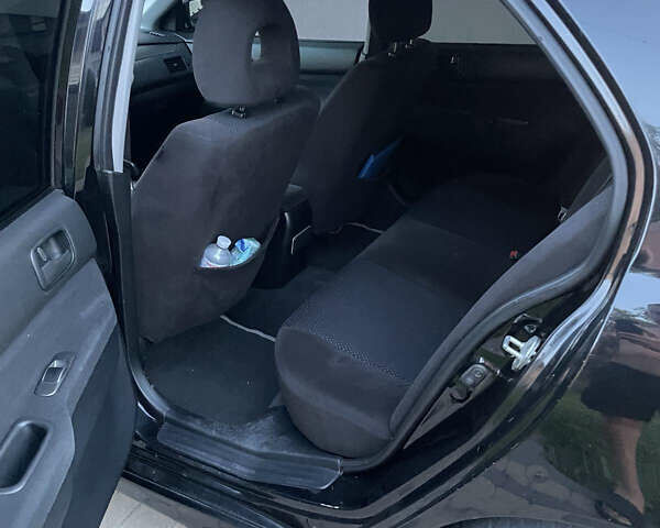 Чорний Міцубісі Lancer, об'ємом двигуна 1.6 л та пробігом 170 тис. км за 4900 $, фото 7 на Automoto.ua