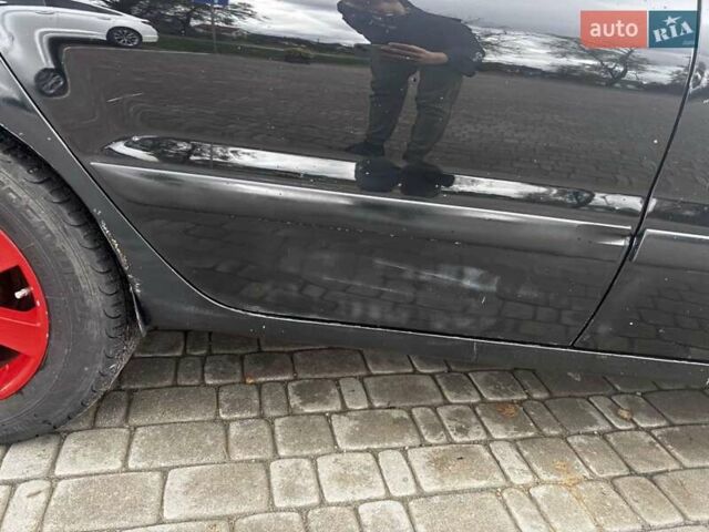 Чорний Міцубісі Lancer, об'ємом двигуна 1.6 л та пробігом 350 тис. км за 3300 $, фото 6 на Automoto.ua
