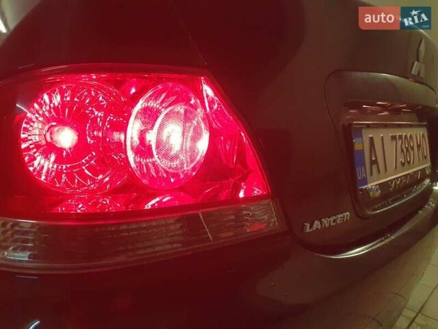 Чорний Міцубісі Lancer, об'ємом двигуна 1.58 л та пробігом 222 тис. км за 2999 $, фото 15 на Automoto.ua