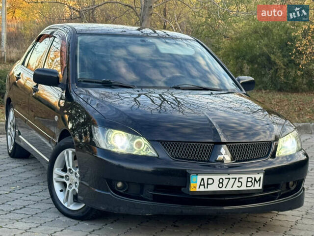 Міцубісі Lancer 2006 у Дніпро (Дніпропетровську) на Automoto.ua Чорний Міцубісі Lancer, об'ємом двигуна 2 л та пробігом 230 тис. км за 4900 $, фото 4 на Automoto.ua