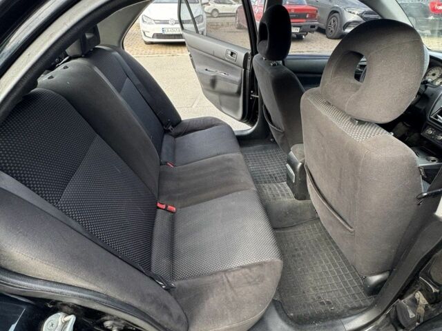 Черный Мицубиси Лансер, объемом двигателя 0 л и пробегом 319 тыс. км за 2700 $, фото 5 на Automoto.ua