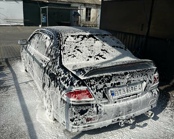 Черный Мицубиси Лансер, объемом двигателя 1.6 л и пробегом 380 тыс. км за 5000 $, фото 8 на Automoto.ua