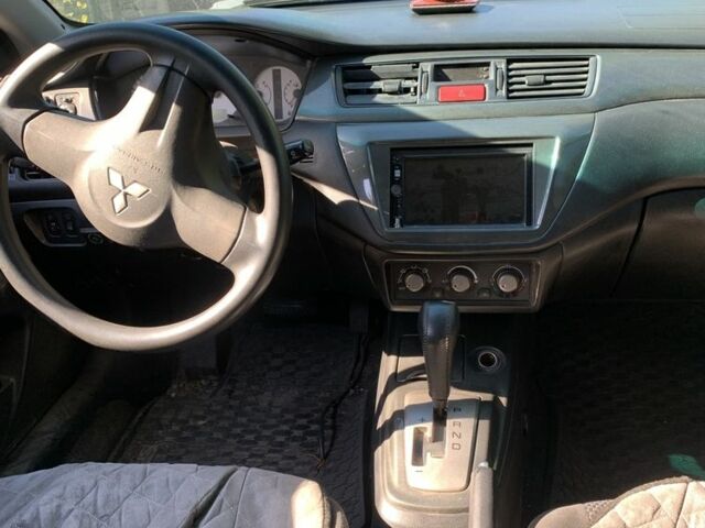 Чорний Міцубісі Lancer, об'ємом двигуна 1.6 л та пробігом 300 тис. км за 4200 $, фото 4 на Automoto.ua