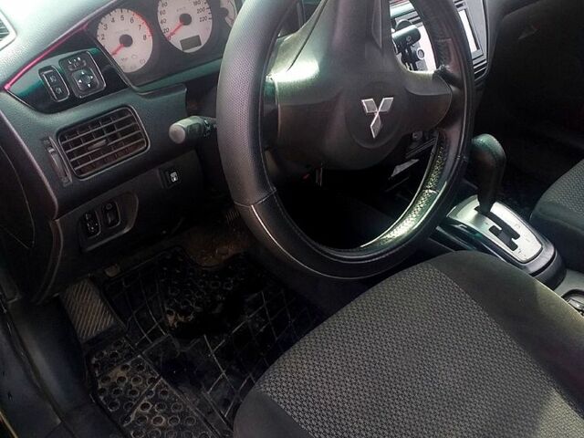 Чорний Міцубісі Lancer, об'ємом двигуна 1.6 л та пробігом 211 тис. км за 3500 $, фото 5 на Automoto.ua
