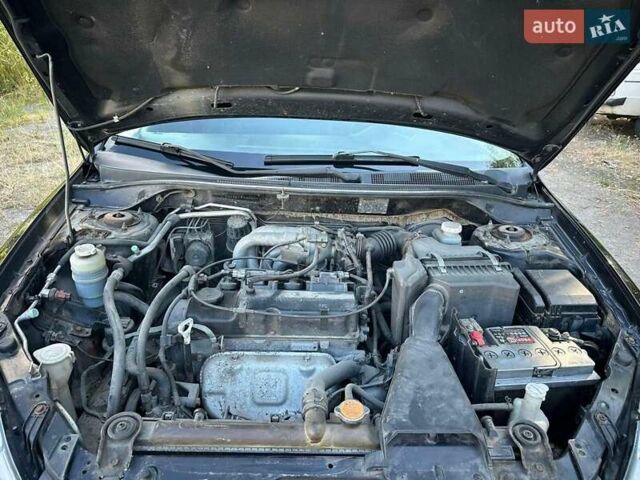 Мицубиси Лансер 2006 в Киеве на Automoto.ua Черный Мицубиси Лансер, объемом двигателя 1.58 л и пробегом 268 тыс. км за 3400 $, фото 19 на Automoto.ua