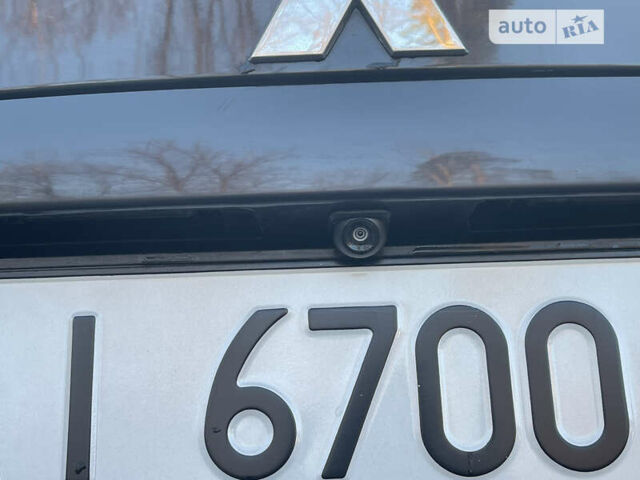Чорний Міцубісі Lancer, об'ємом двигуна 1.58 л та пробігом 256 тис. км за 5350 $, фото 13 на Automoto.ua