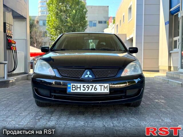 Чорний Міцубісі Lancer, об'ємом двигуна 1.6 л та пробігом 176 тис. км за 3777 $, фото 2 на Automoto.ua