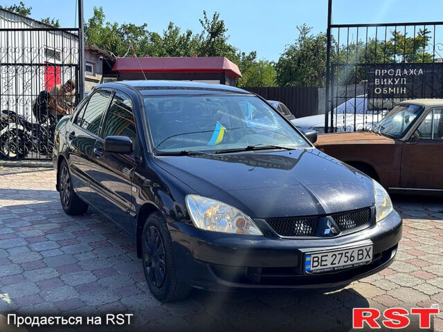 Черный Мицубиси Лансер, объемом двигателя 1.6 л и пробегом 300 тыс. км за 3599 $, фото 2 на Automoto.ua