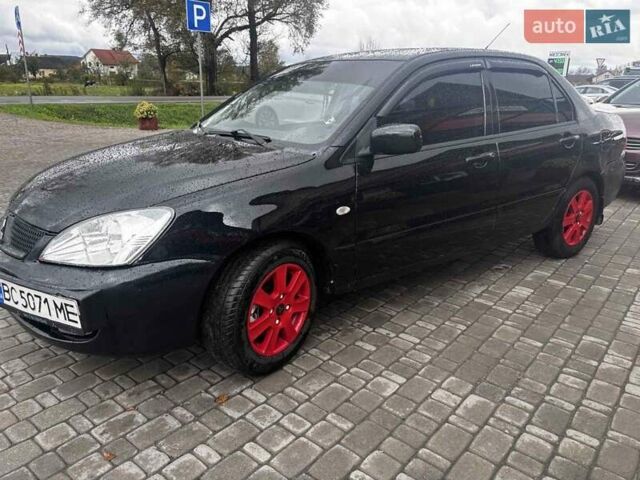 Чорний Міцубісі Lancer, об'ємом двигуна 1.6 л та пробігом 350 тис. км за 3300 $, фото 4 на Automoto.ua
