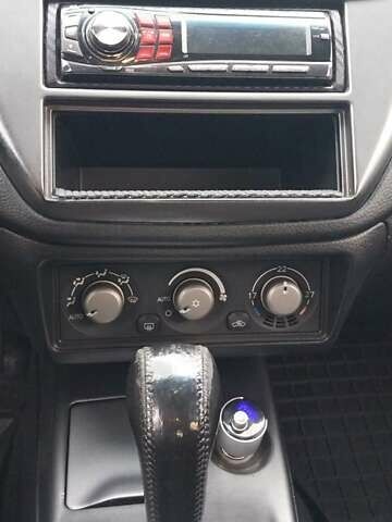 Чорний Міцубісі Lancer, об'ємом двигуна 1.59 л та пробігом 185 тис. км за 4900 $, фото 6 на Automoto.ua