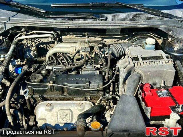 Черный Мицубиси Лансер, объемом двигателя 1.6 л и пробегом 208 тыс. км за 4999 $, фото 6 на Automoto.ua