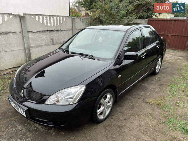 Мицубиси Лансер 2006 в Днепре (Днепропетровске) на Automoto.ua Черный Мицубиси Лансер, объемом двигателя 1.58 л и пробегом 166 тыс. км за 4800 $, фото 1 на Automoto.ua